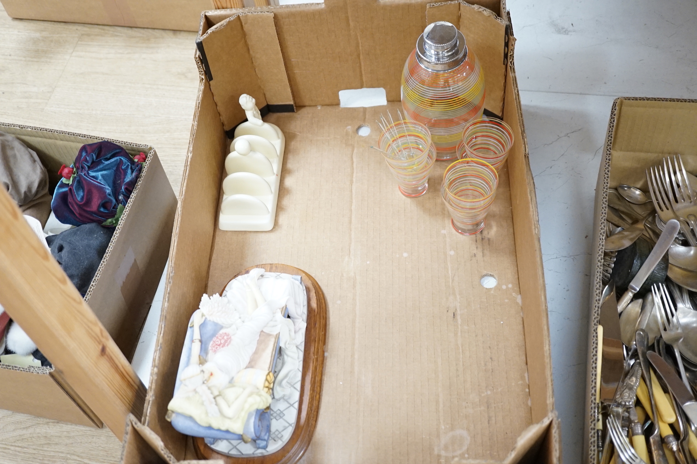 A quantity of mixed ceramics and glass including a Disney style toast rack, a Lurpak toast rack, etc.